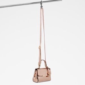 Rose gold Aldo mini purse handbag